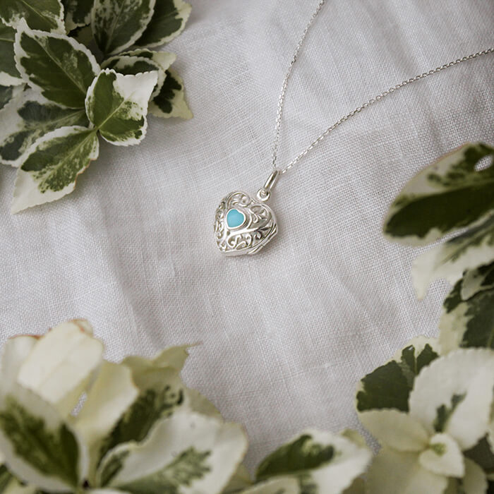 heart shaped locket with turqupise stone