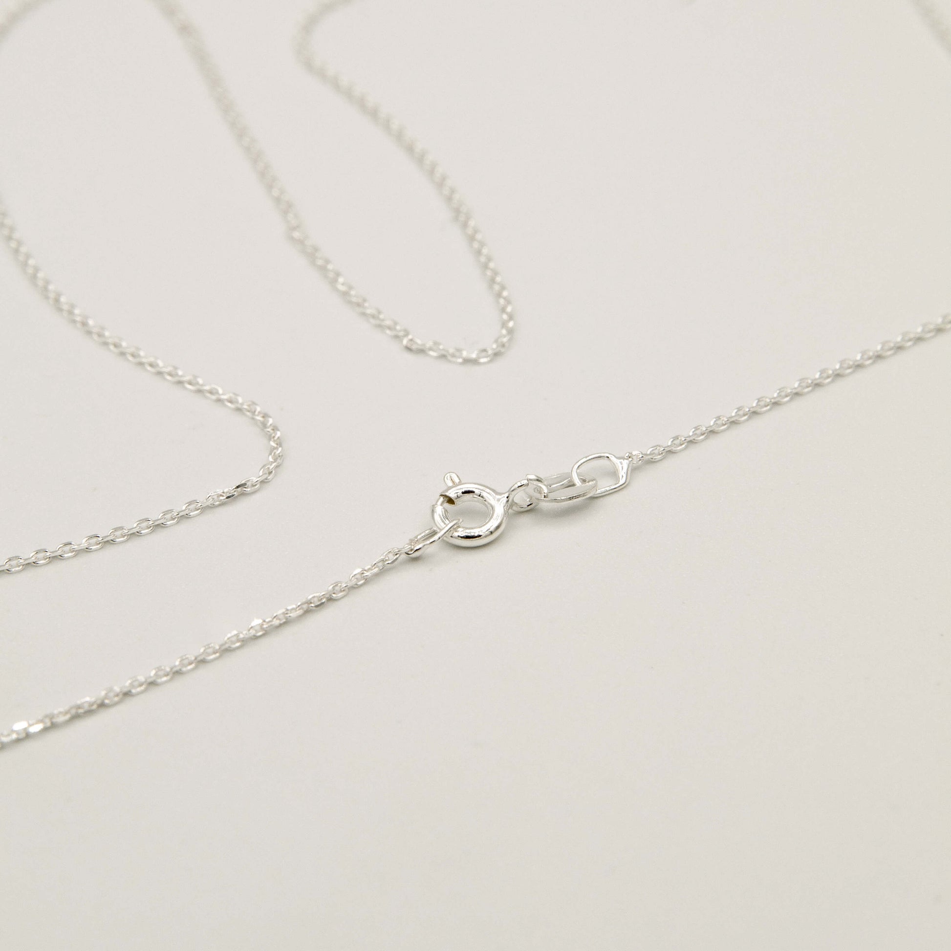 silver chain on a white background