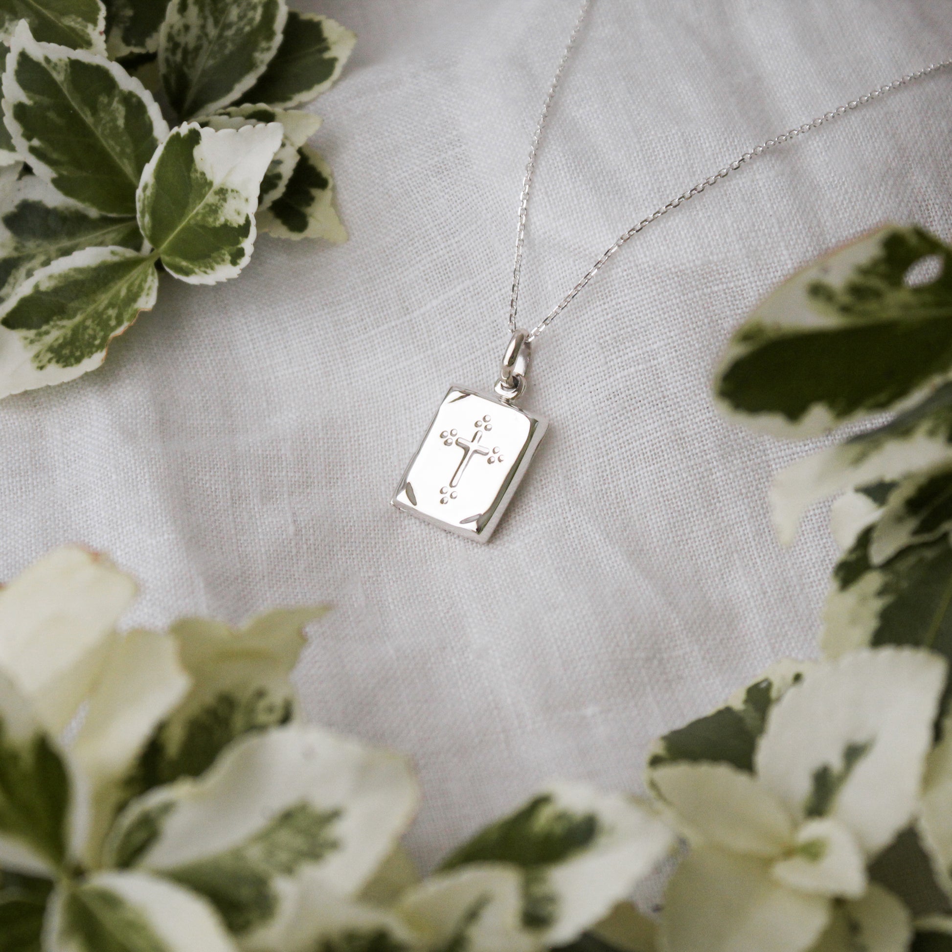 Small prayerbook locket on a white background