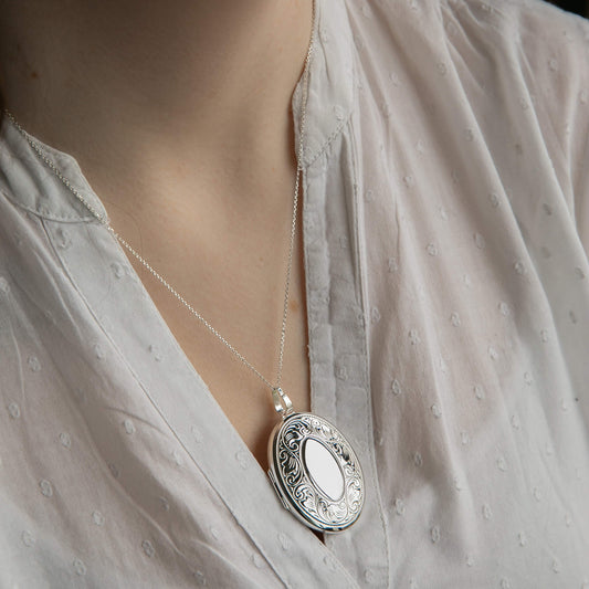 Model wearing extra large silver locket
