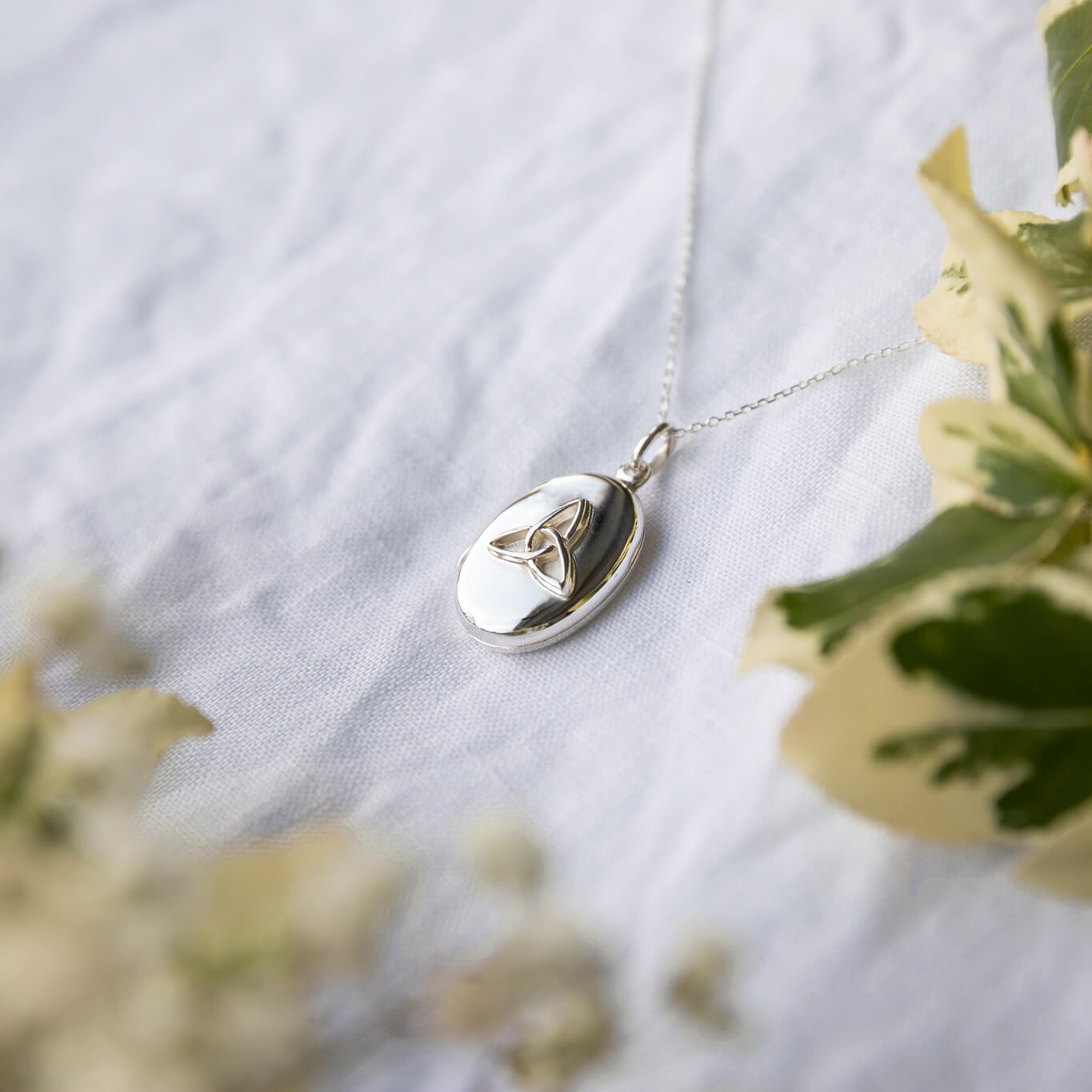 Locket with celtic design on a white background