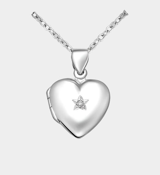 heart shaped silver photo locket with Cubic zirconia stone on a white background